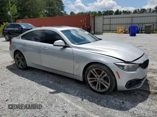 2018 BMW 4 Series 430i xDrive with VIN WBA4J3C54JBG91269, listed as a Copart auction lot 56852555 with 80,142 mi miles and Clean title. Bid and sale history available at DreamBid. Image 4.