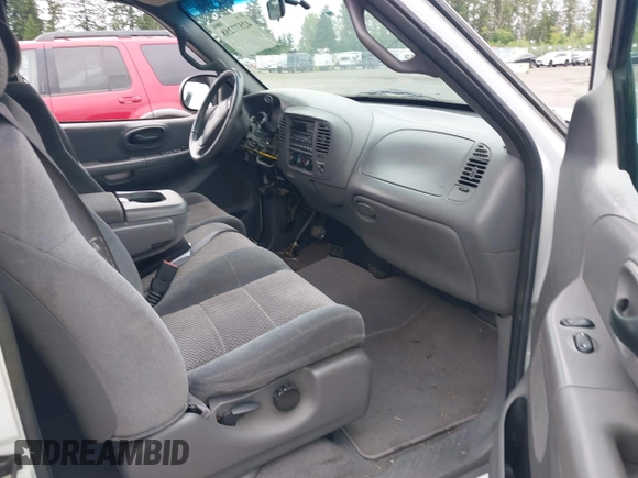 2002 Ford F-150 XL with VIN 1FTRX17L32NA19687, listed as a IAAI auction lot 42577258 with 216,685 mi miles and . Bid and sale history available at DreamBid. Image 5.