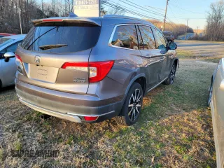 2020 Honda Pilot Touring 8-Passenger with VIN 5FNYF6H93LB022913, listed as a Copart auction lot 50825655 with 10,513 mi miles and Salvage Title. Bid and sale history available at DreamBid. Image 4.