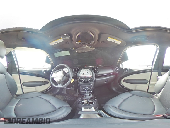 2014 MINI Countryman z VIN WMWZB3C55EWR42069, wystawiony jako Copart lot #54476425 z przebiegiem 42 218 mil mil oraz Szkoda całkowita • Salvage title. Historia ofert i sprzedaży dostępna na DreamBid. Obrazek 14.