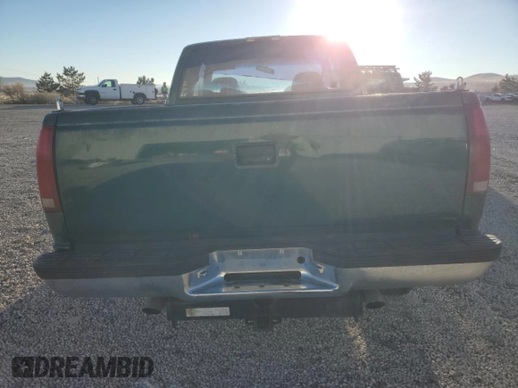 1995 GMC Sierra 1500 z VIN 2GTEK19K6S1580355, wystawiony jako Copart lot #87416254 z przebiegiem 162 829 mil mil oraz Szkody całkowita. Historia ofert i sprzedaży dostępna na DreamBid. Obrazek 6.
