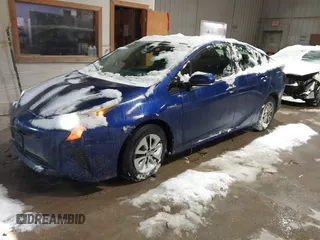 2018 Toyota Prius Two with VIN JTDKBRFU5J3059613, listed as a IAAI auction lot 41581314 with 142,505 mi miles and . Bid and sale history available at carsss.com. Image 2.