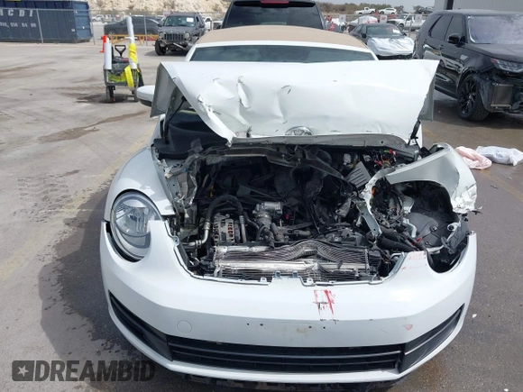 2015 Volkswagen Beetle 1.8T w/Tech with VIN 3VW517AT4FM812294, listed as a IAAI auction lot 41753967 with 59,857 mi miles and . Bid and sale history available at DreamBid. Image 6.
