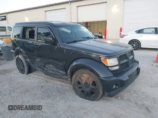 2010 Dodge Nitro SE with VIN 1D4PT2GK3AW137797, listed as a IAAI auction lot 41689701 with 182,452 mi miles. Bid and sale history available at carsss.com. Image 1.