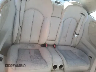 2004 Mercedes-Benz CLK 500 with VIN WDBTK75G54T013397, listed as a Copart auction lot 69033014 with 157,888 mi miles and Salvage Title. Bid and sale history available at carsss.com. Image 10.