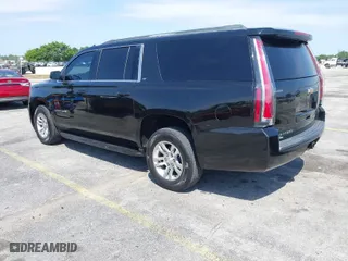 2018 Chevrolet Suburban LT with VIN 1GNSCHKC7JR111560, listed as a IAAI auction lot 41823175 with 136,751 mi miles. Bid and sale history available at carsss.com. Image 3.