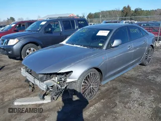2017 Audi A6 Premium Plus z VIN WAUF2AFC4HN037379, wystawiony jako IAAI lot #41302046 z przebiegiem 95 675 mil mil oraz . Historia ofert i sprzedaży dostępna na DreamBid. Obrazek 17.