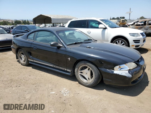 1997 Ford Mustang with VIN 1FALP4048VF172130, listed as a Copart auction lot 59790275 with 125,336 mi miles and Salvage title. Bid and sale history available at DreamBid. Image 4.