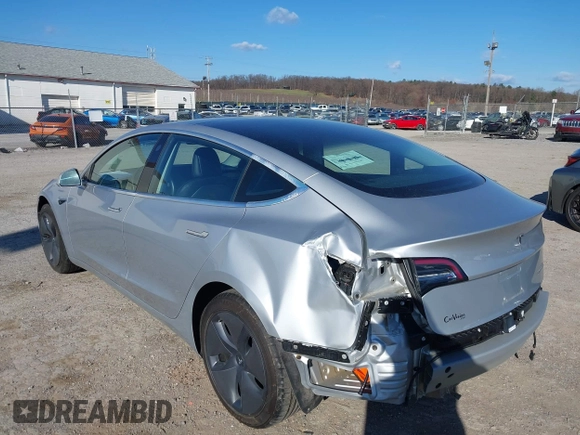 2018 Tesla Model 3 Long Range Battery with VIN 5YJ3E1EB9JF065057, listed as a IAAI auction lot 41863903 with 54,584 mi miles and . Bid and sale history available at DreamBid. Image 6.