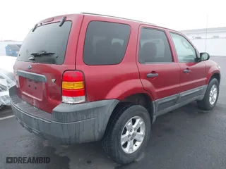 2007 Ford Escape XLT with VIN 1FMCU03147KC00069, listed as a IAAI auction lot 41343434 with 209,220 mi miles. Bid and sale history available at carsss.com. Image 4.