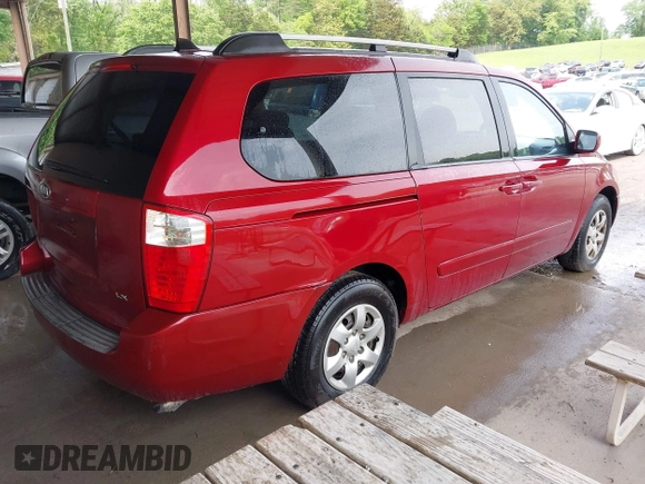 2009 Kia Sedona LX with VIN KNDMB233X96277536, listed as a IAAI auction lot 42108653 with 260,258 mi miles. Bid and sale history available at carsss.com. Image 4.
