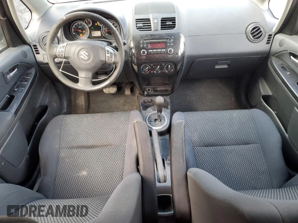 2013 Suzuki SX4 Crossover z VIN JS2YB5A37D6100222, wystawiony jako Copart lot #86614504 z przebiegiem 131 930 mil mil oraz Szkoda całkowita • Salvage title. Historia ofert i sprzedaży dostępna na DreamBid. Obrazek 8.