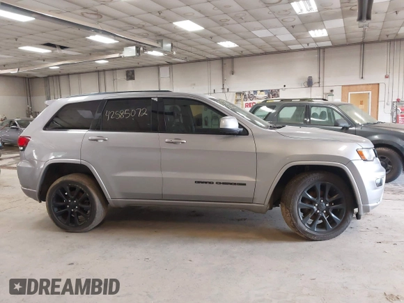 2018 Jeep Grand Cherokee Laredo E with VIN 1C4RJFAG7JC203793, listed as a IAAI auction lot 42585072 with 263,987 mi miles and . Bid and sale history available at DreamBid. Image 13.