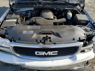 2005 GMC Yukon SLT z VIN 1GKEC13T75R205508, wystawiony jako Copart lot #87511845 z przebiegiem 179 749 mil mil oraz Szkoda całkowita • Salvage title. Historia ofert i sprzedaży dostępna na DreamBid. Obrazek 13.
