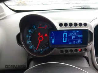 2015 Chevrolet Sonic LT with VIN 1G1JC5SH7F4104412, listed as a IAAI auction lot 41737655 with 124,304 mi miles and . Bid and sale history available at DreamBid. Image 7.