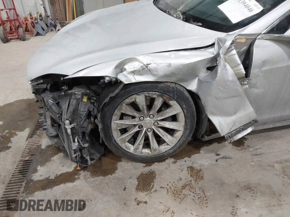 2017 Tesla Model S 100D with VIN 5YJSA1E23HF232059, listed as a IAAI auction lot 41394046 with 84,052 mi miles and . Bid and sale history available at DreamBid. Image 6.