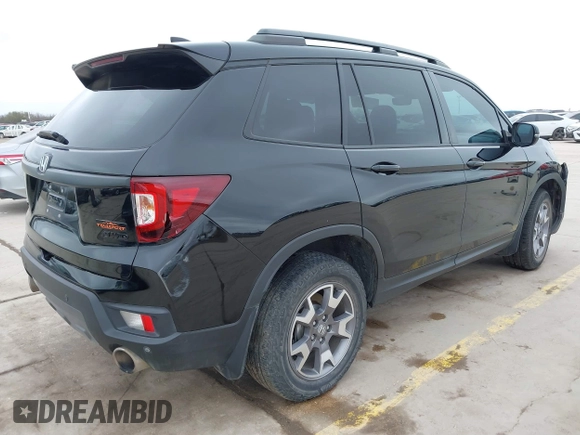 2023 Honda Passport TrailSport with VIN 5FNYF8H67PB006933, listed as a IAAI auction lot 41597859 with 34,145 mi miles and . Bid and sale history available at carsss.com. Image 4.