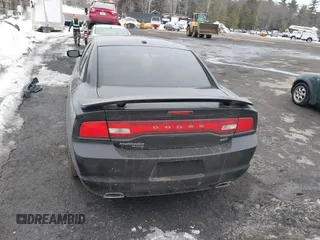 2014 Dodge Charger SXT Plus with VIN 2C3CDXJG2EH163049, listed as a IAAI auction lot 41634369 with 1 mi miles. Bid and sale history available at carsss.com. Image 17.