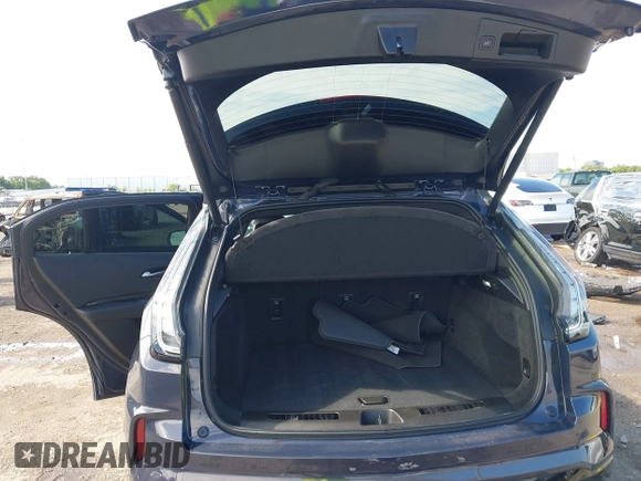 2024 Cadillac XT4 FWD Sport with VIN 1GYFZER40RF226384, listed as a IAAI auction lot 42220804 with 8,743 mi miles and . Bid and sale history available at DreamBid. Image 18.