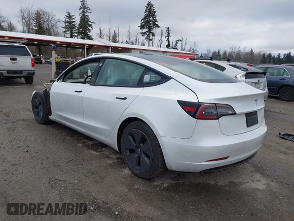 2021 Tesla Model 3 Long Range with VIN 5YJ3E1EB3MF856009, listed as a IAAI auction lot 41809767 with 42,072 mi miles. Bid and sale history available at carsss.com. Image 3.