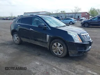 2014 Cadillac SRX Luxury Collection z VIN 3GYFNEE32ES659705, wystawiony jako IAAI lot #42148269 z przebiegiem 140 560 mil mil oraz . Historia ofert i sprzedaży dostępna na DreamBid. Obrazek 1.