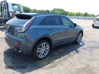 2021 Cadillac XT4 FWD Sport with VIN 1GYFZER41MF079193, listed as a IAAI auction lot 42331594 with 72,287 mi miles and . Bid and sale history available at DreamBid. Image 4.