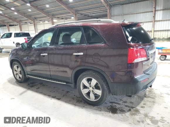2012 Kia Sorento EX z VIN 5XYKU4A64CG219646, wystawiony jako Copart lot #59171315 z przebiegiem 185 806 mil mil oraz Czysty tytuł • Clean title. Historia ofert i sprzedaży dostępna na DreamBid. Obrazek 2.