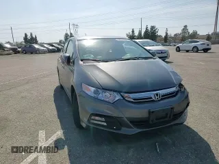 2012 Honda Insight EX z VIN JHMZE2H77CS002907, wystawiony jako Copart lot #52040465 z przebiegiem 158 266 mil mil oraz Szkoda całkowita • Salvage title. Historia ofert i sprzedaży dostępna na DreamBid. Obrazek 11.