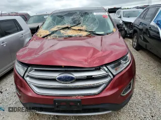 2015 Ford Edge Titanium z VIN 2FMPK4K9XFBB74740, wystawiony jako Copart lot #55529335 z przebiegiem 155 605 mil mil oraz Szkoda całkowita • Salvage title. Historia ofert i sprzedaży dostępna na DreamBid. Obrazek 5.