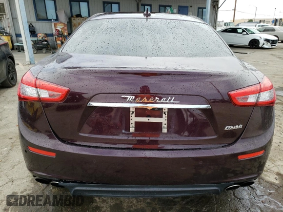 2017 Maserati Ghibli with VIN ZAM57XSA4H1197224, listed as a Copart auction lot 62281233 with 74,389 mi miles. Bid and sale history available at carsss.com. Image 6.