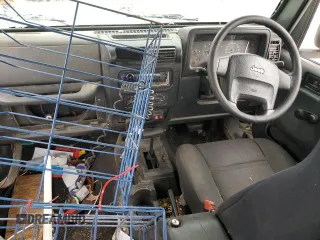 2006 Jeep Wrangler Sport Right Hand Drive with VIN 1J4F449S66P733349, listed as a Copart auction lot 80022794 with 194,692 mi miles and Salvage Title. Bid and sale history available at carsss.com. Image 8.