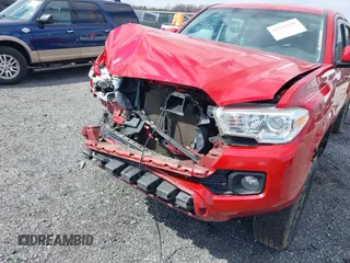 2016 Toyota Tacoma SR5 with VIN 5TFAX5GN0GX057704, listed as a IAAI auction lot 41890138 with 110,799 mi miles. Bid and sale history available at carsss.com. Image 6.