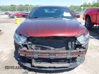 2016 Ford Taurus SEL z VIN 1FAHP2H8XGG136549, wystawiony jako IAAI lot #42338455 z przebiegiem 170 123 mil mil oraz . Historia ofert i sprzedaży dostępna na DreamBid. Obrazek 13.