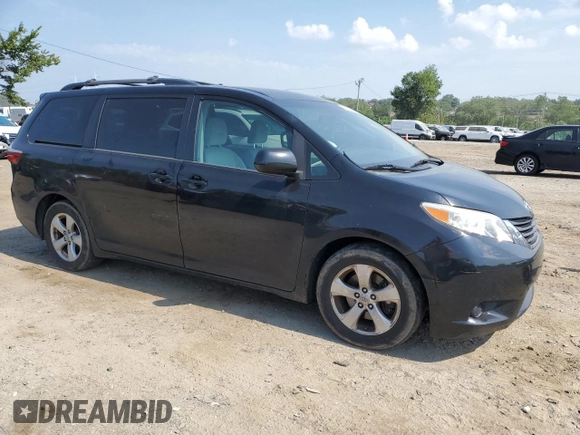 2015 Toyota Sienna LE AAS with VIN 5TDKK3DC7FS686021, listed as a Copart auction lot 66761315 with 241,779 mi miles and Clean title. Bid and sale history available at DreamBid. Image 4.
