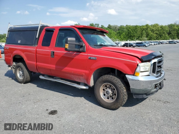 2003 Ford F-250 XL with VIN 1FTNX21L93EA90875, listed as a Copart auction lot 60304115 with 136,956 mi miles and Salvage title. Bid and sale history available at DreamBid. Image 4.