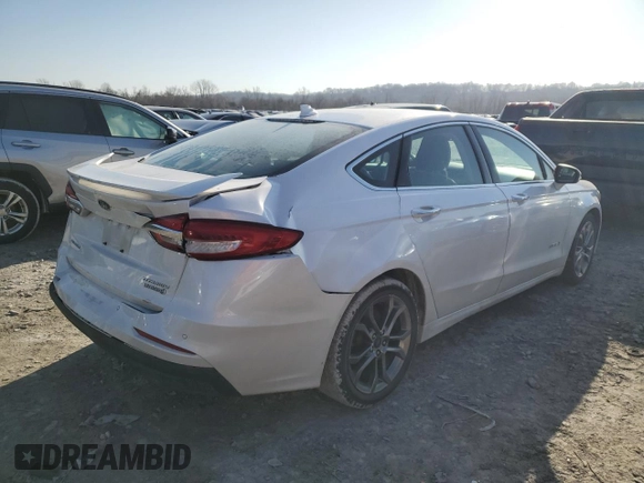 2019 Ford Fusion Hybrid Titanium with VIN 3FA6P0RU0KR277431, listed as a Copart auction lot 48234545 with 87,043 mi miles and Salvage Title. Bid and sale history available at carsss.com. Image 3.