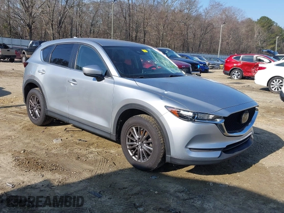 2020 Mazda CX-5 Touring with VIN JM3KFACM8L0727393, listed as a IAAI auction lot 41492627 with 91,521 mi miles. Bid and sale history available at carsss.com. Image 1.