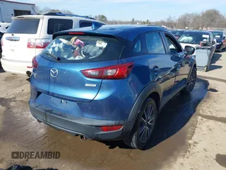 2018 Mazda CX-3 Touring z VIN JM1DKFC73J0301449, wystawiony jako IAAI lot #41678604 z przebiegiem 105 249 mil mil oraz . Historia ofert i sprzedaży dostępna na DreamBid. Obrazek 4.