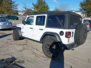 2021 Jeep Wrangler Unlimited Sport S with VIN 1C4HJXDG5MW697149, listed as a IAAI auction lot 41642386 with 71,253 mi miles. Bid and sale history available at carsss.com. Image 3.
