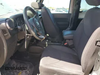 2013 Jeep Wrangler Sport with VIN 1C4AJWAG5DL706031, listed as a Copart auction lot 54594465 with 103,718 mi miles and Salvage Title. Bid and sale history available at carsss.com. Image 7.