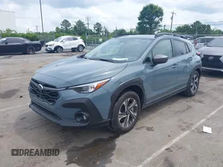 2024 Subaru Crosstrek Premium z VIN JF2GUADC7R8299418, wystawiony jako IAAI lot #42358005 z przebiegiem 21 690 mil mil oraz . Historia ofert i sprzedaży dostępna na DreamBid. Obrazek 19.