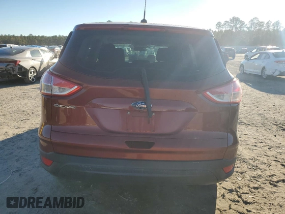 2016 Ford Escape S with VIN 1FMCU0F70GUA71428, listed as a Copart auction lot 84221944 with 186,507 mi miles and Salvage Title. Bid and sale history available at carsss.com. Image 6.