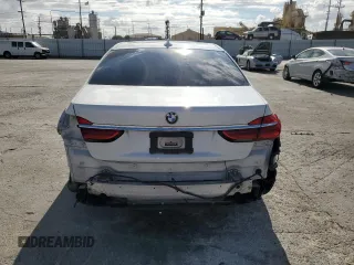 2018 BMW 7 Series 740e xDrive iPerformance with VIN WBA7J2C51JG938111, listed as a Copart auction lot 73361933 with 104,641 mi miles. Bid and sale history available at carsss.com. Image 6.