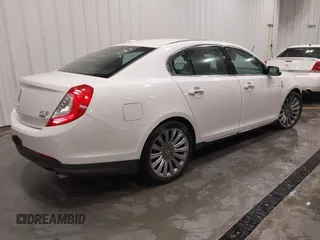 2014 Lincoln MKS with VIN 1LNHL9EK5EG605750, listed as a IAAI auction lot 41565308 with 167,835 mi miles. Bid and sale history available at carsss.com. Image 4.