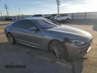 2015 BMW 6 Series 650i with VIN WBAYM9C53FD248356, listed as a Copart auction lot 85499554 with 115,292 mi miles and Salvage Title. Bid and sale history available at DreamBid. Image 4.