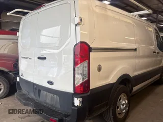 2021 Ford Transit Cargo with VIN 1FTBR2YG2MKA51800, listed as a IAAI auction lot 42793917 with 61,733 mi miles and . Bid and sale history available at DreamBid. Image 34.
