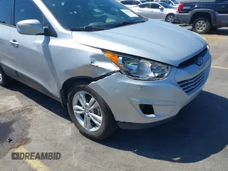 2013 Hyundai Tucson GLS with VIN KM8JU3AC3DU551018, listed as a IAAI auction lot 41988305 with 214,728 mi miles. Bid and sale history available at carsss.com. Image 6.