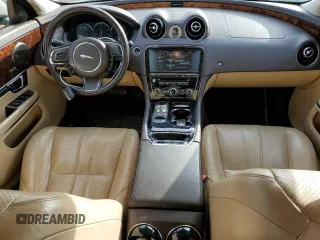 2014 Jaguar XJ with VIN SAJWA1CZ5E8V71971, listed as a Copart auction lot 82116114 with 127,164 mi miles and Salvage Title. Bid and sale history available at DreamBid. Image 8.