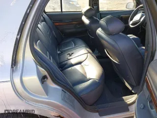 1998 Mercury Grand Marquis LS with VIN 2MEFM75W2WX657976, listed as a IAAI auction lot 41418388 with 102,093 mi miles. Bid and sale history available at carsss.com. Image 8.