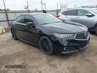 2018 Acura TLX w/A-SPEC Pkg z VIN 19UUB3F60JA002188, wystawiony jako IAAI lot #42135594 z przebiegiem 149 389 mil mil oraz . Historia ofert i sprzedaży dostępna na DreamBid. Obrazek 1.